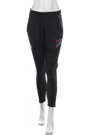 Damskie spodnie sportowe Nike, Rozmiar S, Kolor Czarny, 91% poliester, 9% elastyna, Cena 172,72 zł