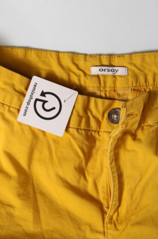 Damskie spodnie Orsay, Rozmiar L, Kolor Żółty, Cena 41,74 zł