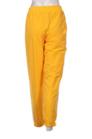 Damskie spodnie sportowe Adidas x Paolina Russo, Rozmiar S, Kolor Żółty, Cena 229,05 zł