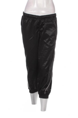 Γυναικείο αθλητικό παντελόνι Umbro, Μέγεθος S, Χρώμα Μαύρο, Τιμή 16,70 €