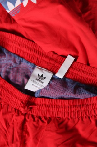 Męskie spodnie sportowe Adidas Originals, Rozmiar M, Kolor Kolorowy, Cena 94,25 zł