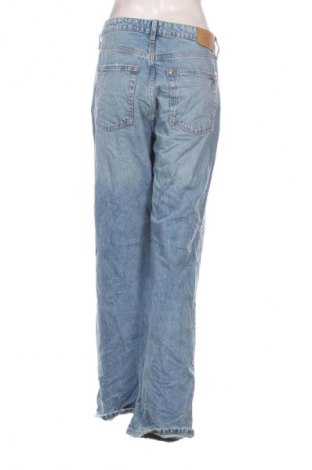 Damskie jeansy H&M, Rozmiar L, Kolor Niebieski, Cena 95,99 zł