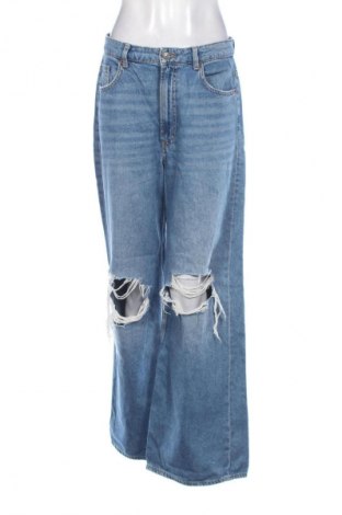 Damskie jeansy H&M Divided, Rozmiar M, Kolor Niebieski, Cena 66,69 zł