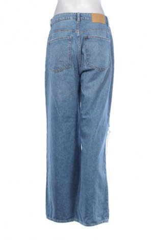 Damskie jeansy H&M Divided, Rozmiar M, Kolor Niebieski, Cena 66,69 zł