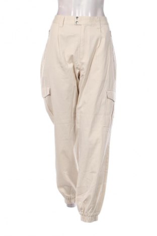 Női nadrág Tommy Jeans, Méret L, Szín Bézs, Ár 53 529 Ft