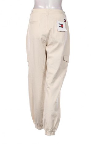 Női nadrág Tommy Jeans, Méret L, Szín Bézs, Ár 53 529 Ft
