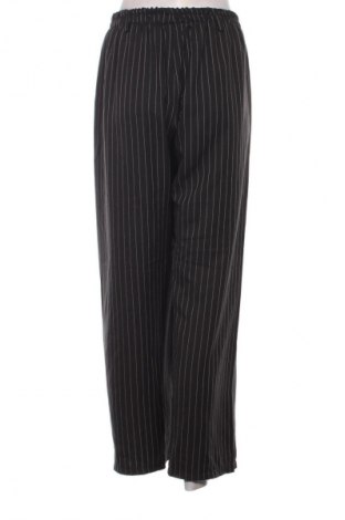Damskie spodnie Unbranded, Rozmiar L, Kolor Kolorowy, Cena 150,99 zł