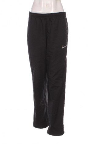 Damskie spodnie sportowe Nike, Rozmiar M, Kolor Czarny, Cena 105,99 zł