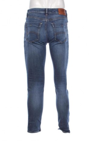 Męskie jeansy Tommy Jeans, Rozmiar S, Kolor Niebieski, Cena 245,99 zł
