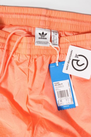 Damskie spodnie sportowe Adidas Originals, Rozmiar L, Kolor Pomarańczowy, Poliamid, Cena 237,89 zł