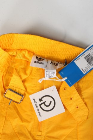 Damskie spodnie Adidas Originals, Rozmiar XXS, Kolor Żółty, Cena 330,52 zł