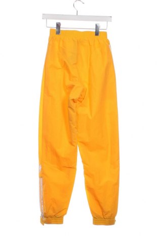 Damskie spodnie Adidas Originals, Rozmiar XXS, Kolor Żółty, Cena 330,52 zł