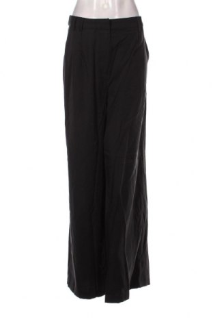 Γυναικείο παντελόνι Guido Maria Kretschmer for About You, Μέγεθος XL, Χρώμα Μαύρο, Τιμή 11,51 €