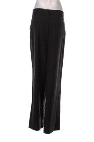 Γυναικείο παντελόνι Guido Maria Kretschmer for About You, Μέγεθος XL, Χρώμα Μαύρο, Τιμή 47,94 €