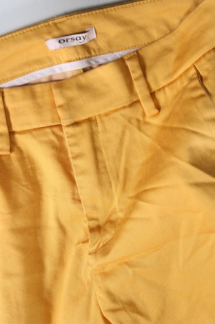 Damskie spodnie Orsay, Rozmiar XS, Kolor Żółty, Cena 92,76 zł