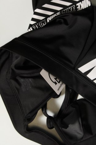 Γυναίκειο αθλητικό τοπ Nike, Μέγεθος XL, Χρώμα Μαύρο, Τιμή 17,76 €