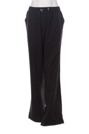 Γυναικείο αθλητικό παντελόνι FILA, Μέγεθος L, Χρώμα Μαύρο, Τιμή 19,18 €