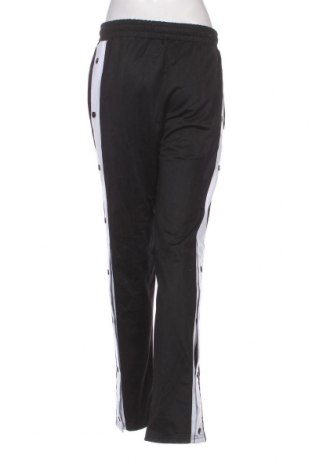 Γυναικείο αθλητικό παντελόνι Slazenger, Μέγεθος M, Χρώμα Μαύρο, Τιμή 3,59 €
