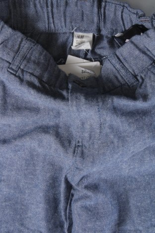 Dziecięce spodnie H&M, Rozmiar 6-7y/ 122-128 cm, Kolor Niebieski, Cena 42,22 zł