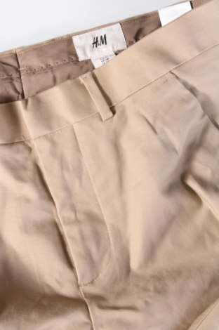 Męskie spodnie H&M, Rozmiar L, Kolor Beżowy, Cena 41,79 zł