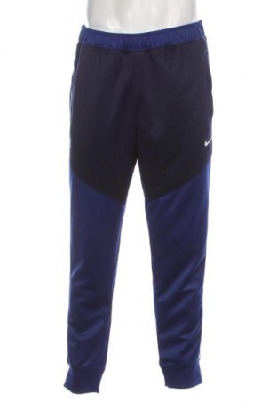 Pantaloni trening de bărbați Nike, Mărime L, Culoare Albastru, Preț 305,92 Lei