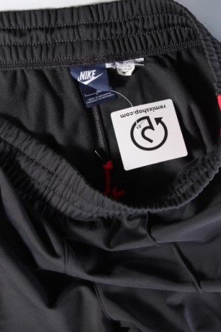 Herren Sporthose Nike, Größe L, Farbe Grau, Preis 28,53 €