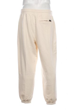 Ανδρικό αθλητικό παντελόνι PUMA, Μέγεθος M, Χρώμα Εκρού, Τιμή 35,96 €