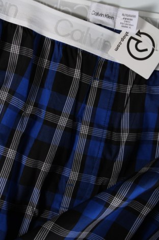 Piżama
 Calvin Klein, Rozmiar XL, Kolor Kolorowy, Cena 149,93 zł
