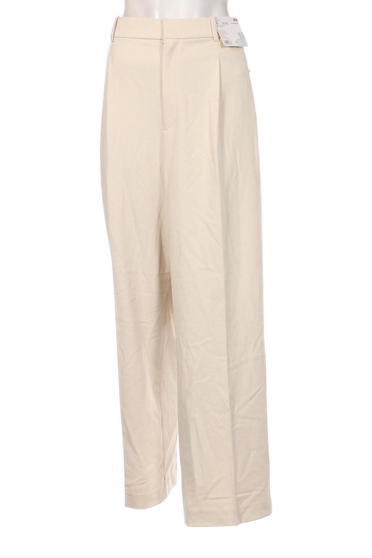 Дамски панталон Uniqlo, Размер XL, Цвят Бежов, Цена 39,10 лв.