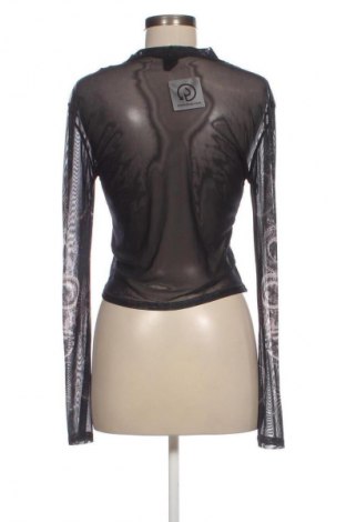 Bluzka damska Urban Outfitters, Rozmiar L, Kolor Kolorowy, Cena 80,11 zł