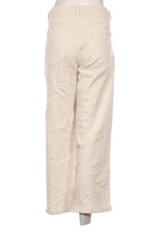 Damskie jeansy Denim 1953, Rozmiar L, Kolor ecru, Cena 95,99 zł