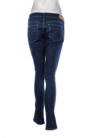 Damskie jeansy H&M, Rozmiar L, Kolor Niebieski, Cena 68,33 zł