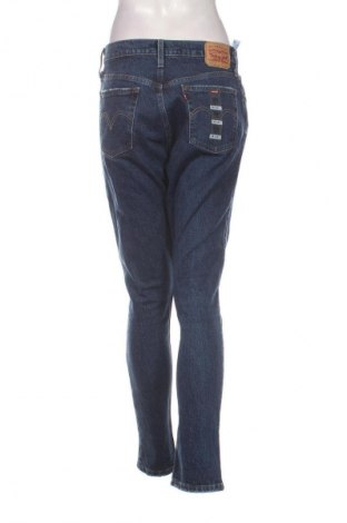 Damskie jeansy Signature By Levi Strauss & Co, Rozmiar M, Kolor Niebieski, Cena 135,99 zł