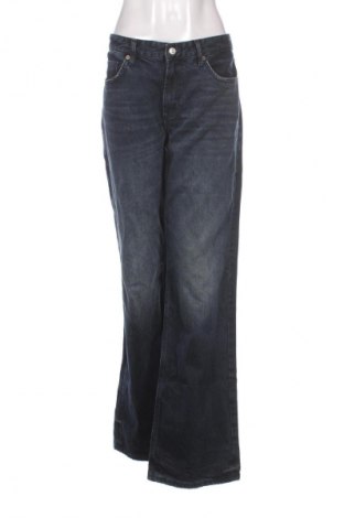 Damskie jeansy Zara, Rozmiar L, Kolor Niebieski, Cena 62,92 zł