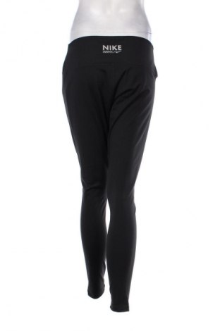 Γυναικείο κολάν Nike, Μέγεθος XL, Χρώμα Μαύρο, Τιμή 49,99 €