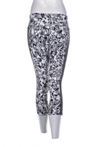 Damskie legginsy Nike, Rozmiar M, Kolor Kolorowy, Cena 157,87 zł