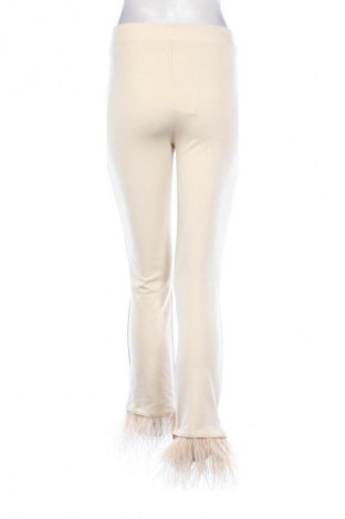 Damskie spodnie Calzedonia, Rozmiar M, Kolor Beżowy, Cena 134,36 zł