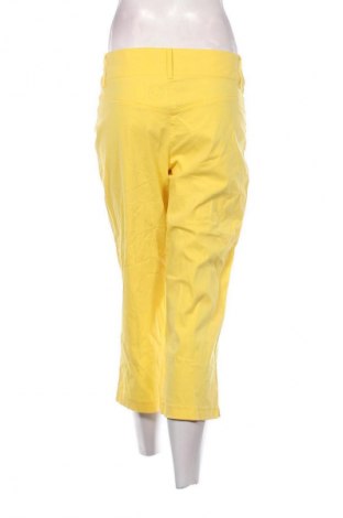 Damskie spodnie Crazy World, Rozmiar M, Kolor Żółty, Cena 38,99 zł