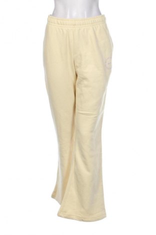 Pantaloni de femei Nike, Mărime L, Culoare Galben, Preț 314,20 Lei