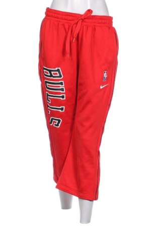 Damskie spodnie sportowe Nike, Rozmiar L, Kolor Czerwony, Cena 214,00 zł