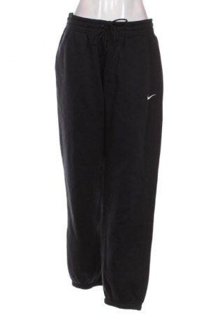 Γυναικείο αθλητικό παντελόνι Nike, Μέγεθος M, Χρώμα Μπλέ, Τιμή 59,99 €
