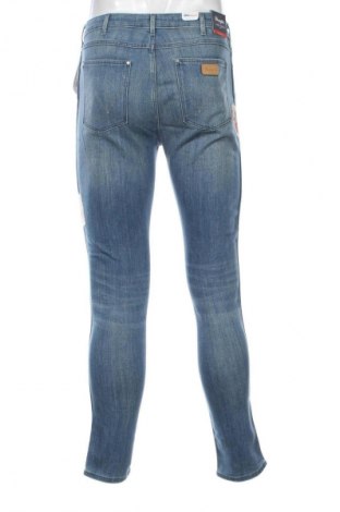 Pánske džínsy  Wrangler, Veľkosť M, Farba Modrá, Cena  94,43 €