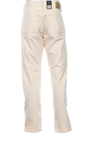 Męskie spodnie G-Star Raw, Rozmiar XL, Kolor ecru, Cena 624,99 zł