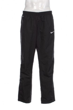 Męskie spodnie sportowe Nike, Rozmiar XL, Kolor Czarny, Cena 157,99 zł