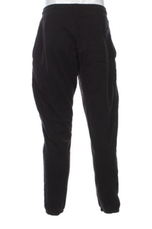 Мъжко спортно долнище Tommy Jeans, Размер M, Цвят Черен, Цена 157,99 лв.