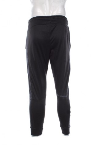 Męskie spodnie sportowe Under Armour, Rozmiar S, Kolor Czarny, Cena 355,99 zł