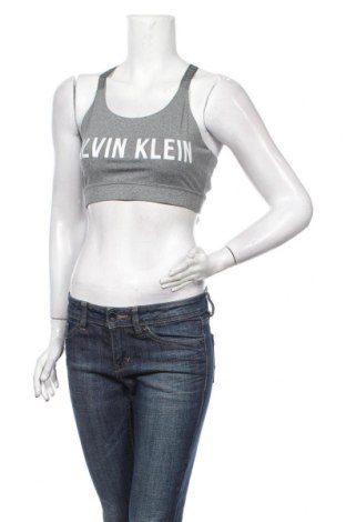 Γυναίκειο αθλητικό τοπ Calvin Klein, Μέγεθος L, Χρώμα Γκρί, 88% πολυεστέρας, 12% ελαστάνη, Τιμή 32,12 €