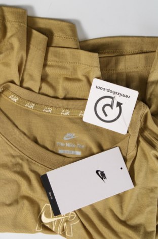 Γυναικείο t-shirt Nike, Μέγεθος XL, Χρώμα Πράσινο, Τιμή 30,36 €