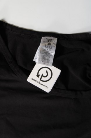 Damen T-Shirt Reebok, Größe XS, Farbe Schwarz, Preis 31,96 €