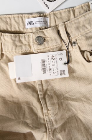 Damskie jeansy H&M, Rozmiar L, Kolor Beżowy, Cena 88,28 zł